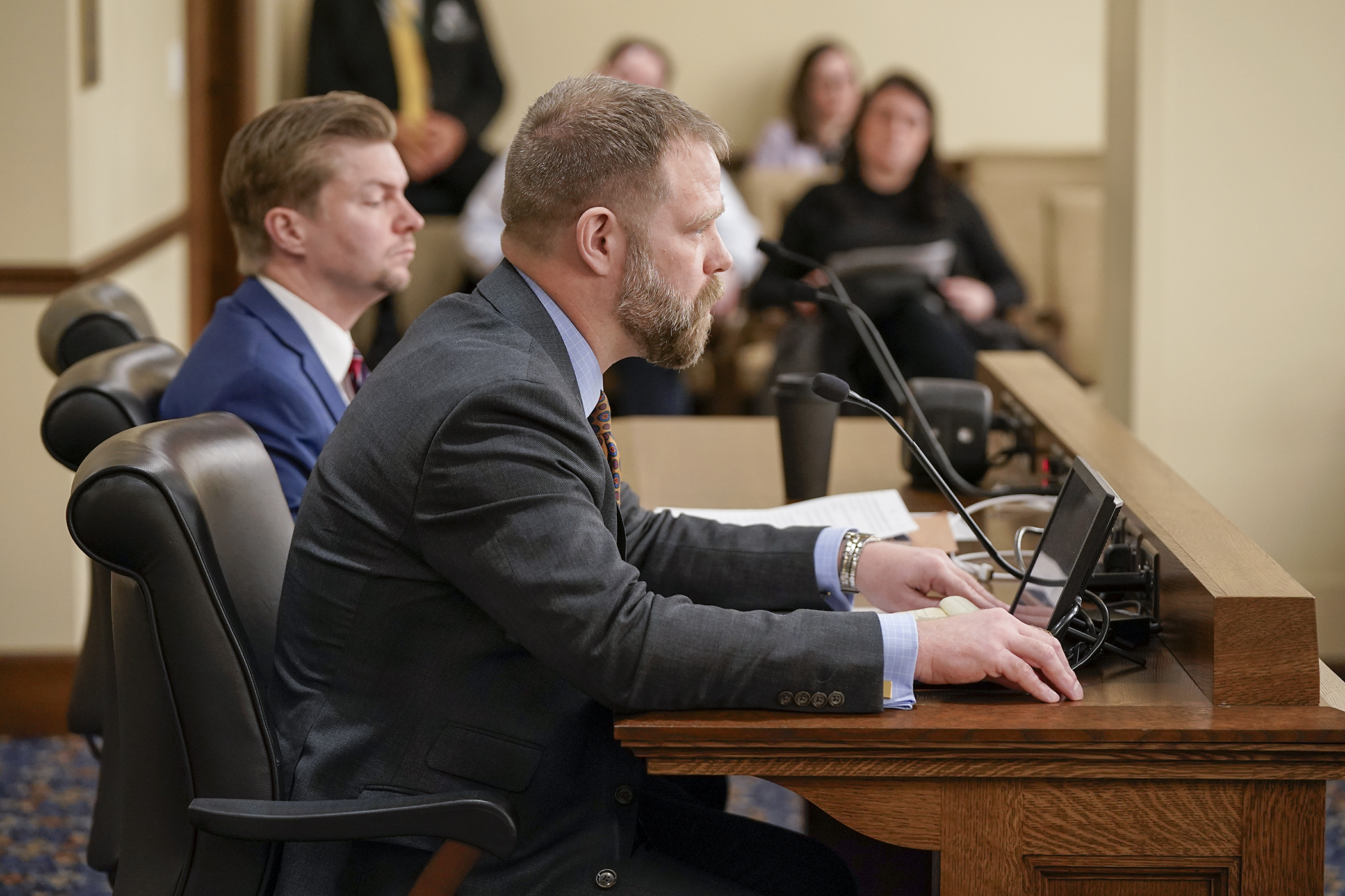 Devin Bruce, director of legislative and political affairs at the Minnesota Association of Professional Employees, testifies before the House State Government Finance and Policy Committee against HF3395. (Photo by Michele Jokinen)